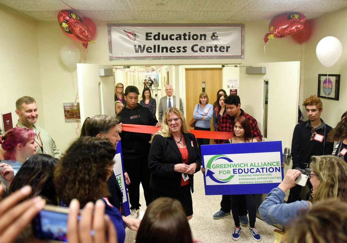 Greenwich Public School Superintendent Toni Jones speaks at the ribbon-cutting of the new Education & Wellness Center wing at Greenwich High School in Greenwich, Conn. Tuesday, Oct. 8, 2019. The Center addresses the complex emotional, academic and behavioral issues of students in a therapeutic and structured setting to support positive mental health and academics.