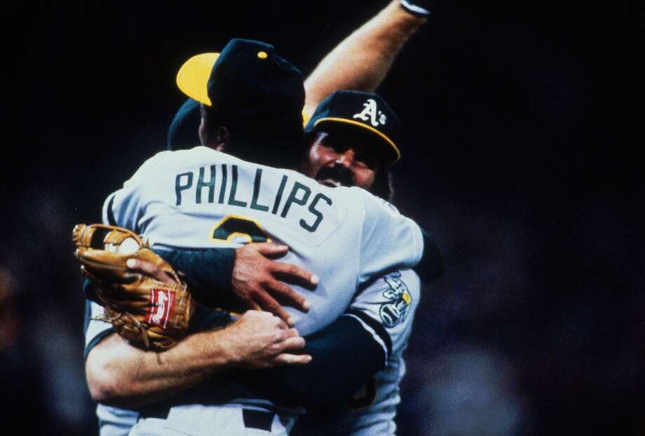 SAN FRANCISCO - OCTOBER 28: Dennis Eckersley embraces Tony Phillips after the Oakland Athletics won the World Series against the San Francisco Giants in game 4 of the series at Candlestick Park in San Francisco, California on October 28, 1989. The Athletics defeated the Giants 9-6. (Photo by Focus on Sport via Getty Images) Photo: Focus On Sport/Getty Images 1989