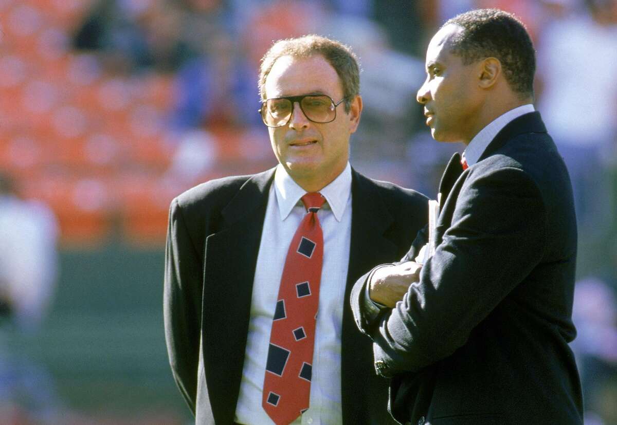 SAN FRANCISCO - SEPTEMBER 5: ABC anchormen (R-L) Al Michaels and Lynn Swann looks on during a game with the Los Angeles Raiders against the San Francisco 49ers at Candlestick Park on September 5, 1994 in San Francisco, California. The 49ers won 44-14. ~~
