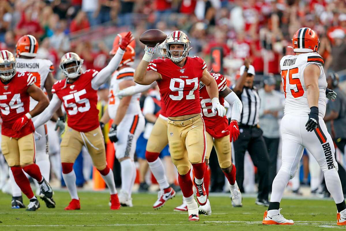 San Francisco 49ers' Nick Bosa celebrates his recovery of a fumble by Cleveland Browns' Baker Mayfield in 1st quarter during NFL game at Levi's Stadium in Santa Clara, Calif., on Monday, October 7, 2019.