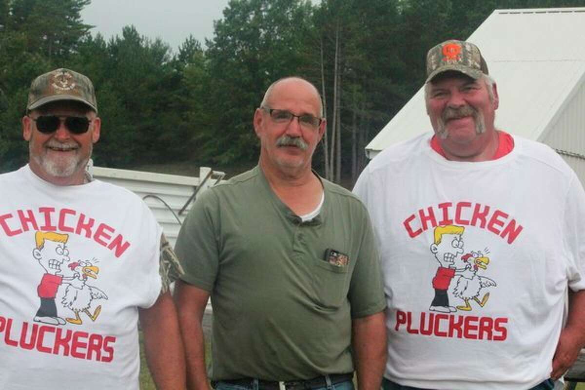 Howard Lodholtz (center) stands with fellow members of the Reed City Sportsman Club Terry Getts (left) and Mark Curtiss after a recent event. (Herald Review photo/John Raffel)