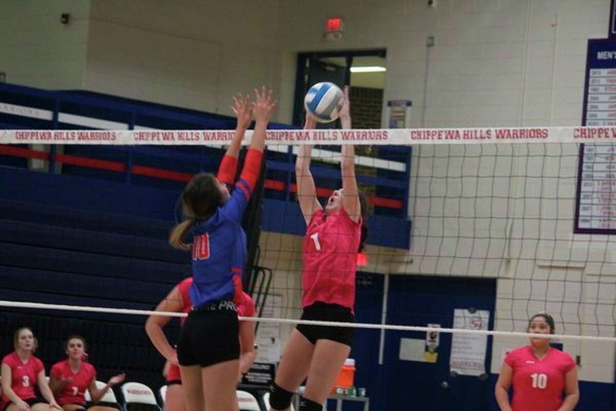 Reed City's Demi Lodholtz goes for the ball against Chippewa Hills. (Herald Review photo/John Raffel)