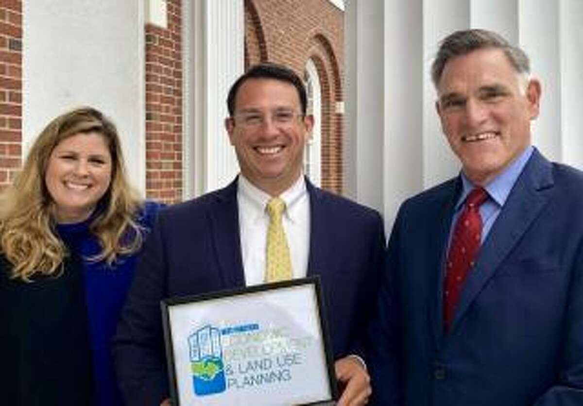 Julie Nash, director of Economic and Community Development, Mayor Ben Blake and Joe Griffith, director of the Department of Permitting and Land Use.
