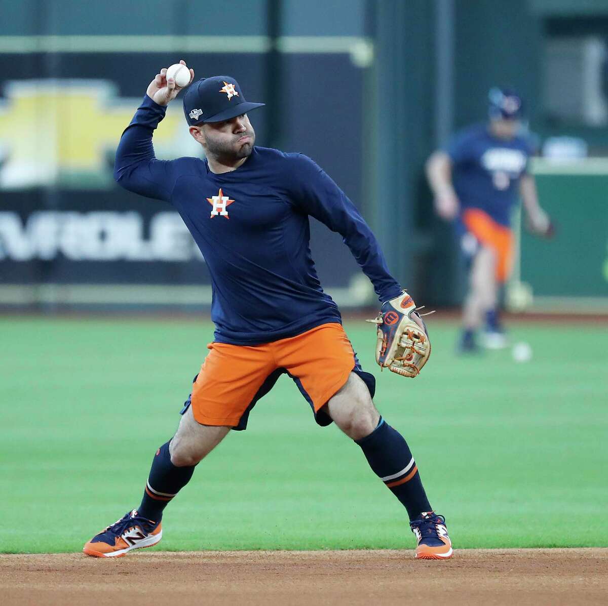 Houston Astros Jose Altuve fields ground balls during optional workouts at Minute Maid Park, Wednesday, Oct. 9, 2019, in Houston.
