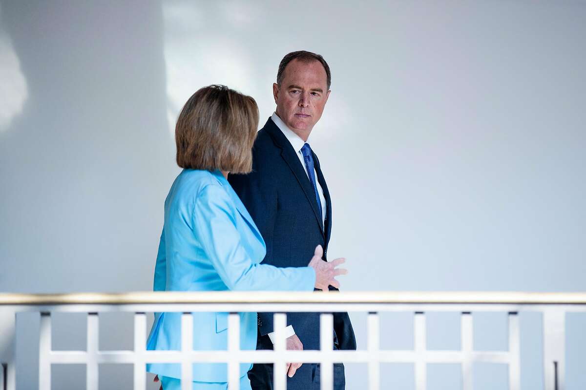 House Speaker Nancy Pelosi (D-Calif.) and House Intelligence Committee Chairman Adam Schiff (D-Calif.) walk to a news conference on Capitol Hill, in Washington on Wednesday, Oct. 2, 2019. They spoke about their impeachment inquiry of President Trump. (Anna Moneymaker/The New York Times)