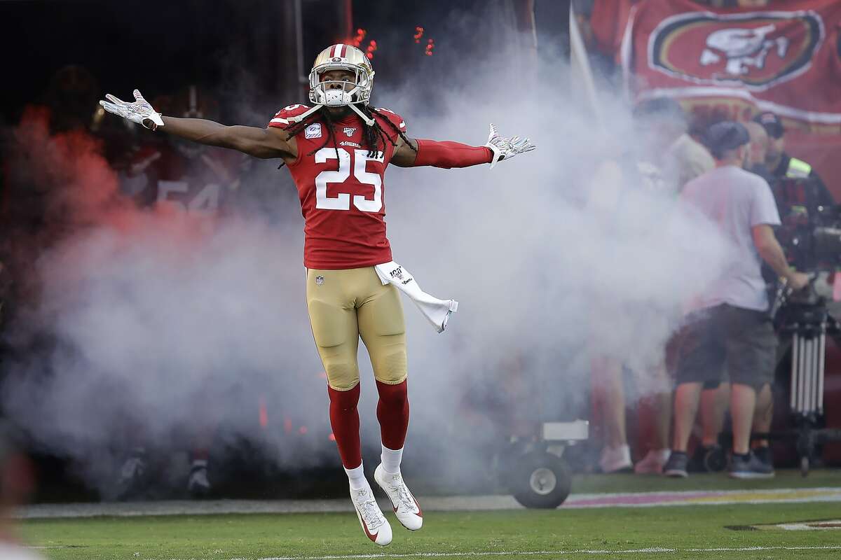 HOUSTON, TX - AUGUST 25: San Francisco 49ers wide receiver Deebo Samuel  (19) chats with  TNF commentator and former NFL cornerback Richard  Sherman during the NFL game between the San Francisco