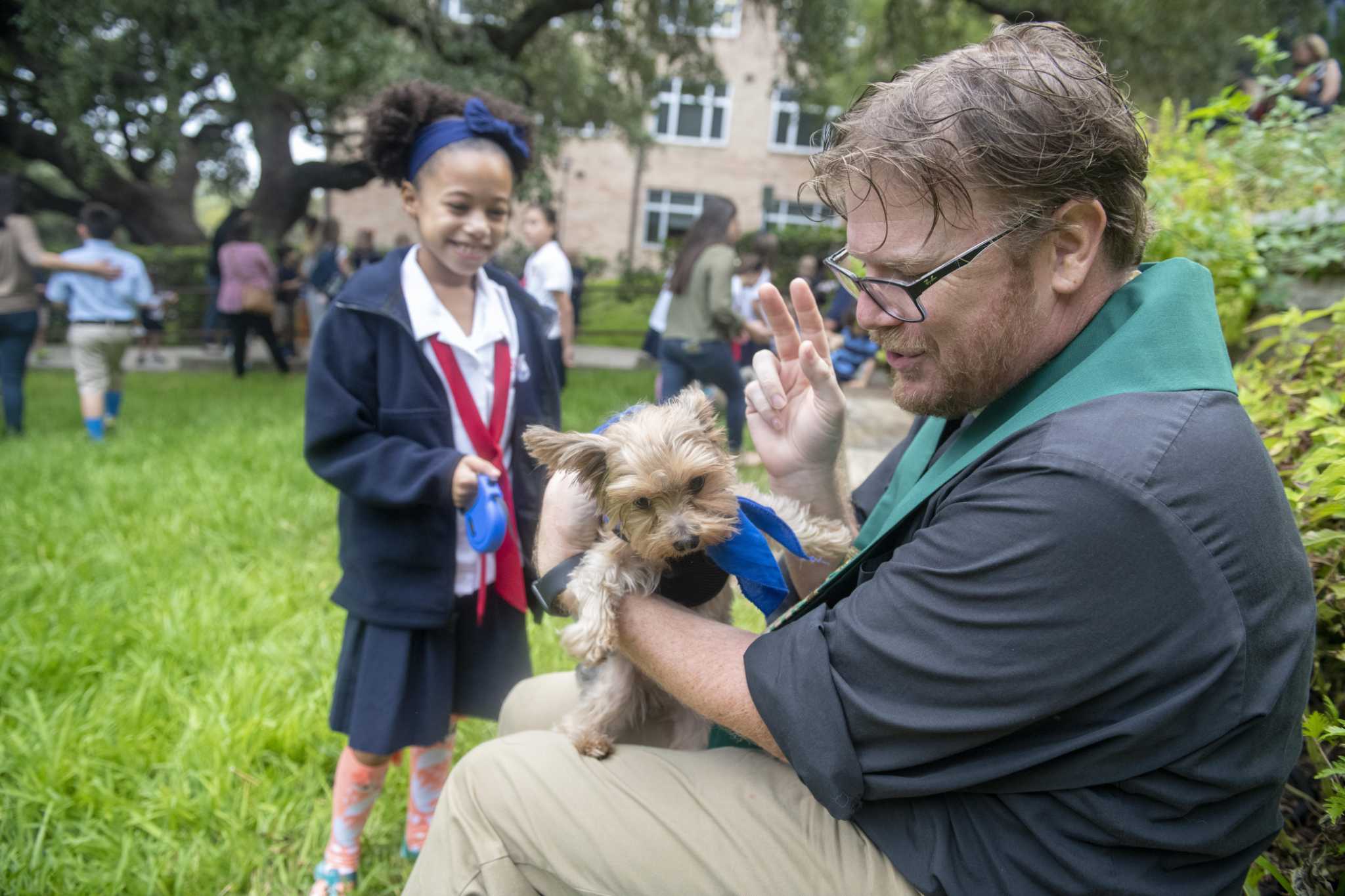 Fur to fins, San Antonio students bring their pets to school for blessing