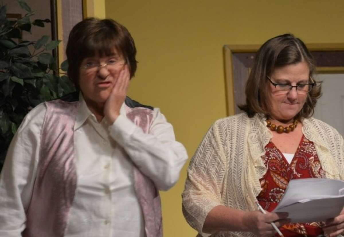 STAGE LEFT: Ellen Finkbeiner, and Shelly Gerring rehearse their rolls in "Mystery at the Reed City Library," which will take place at 7 p.m. on Jan. 22, 23, 29 and 30, and at 2 p.m. on January 24 and 31. (Courtesy photo)