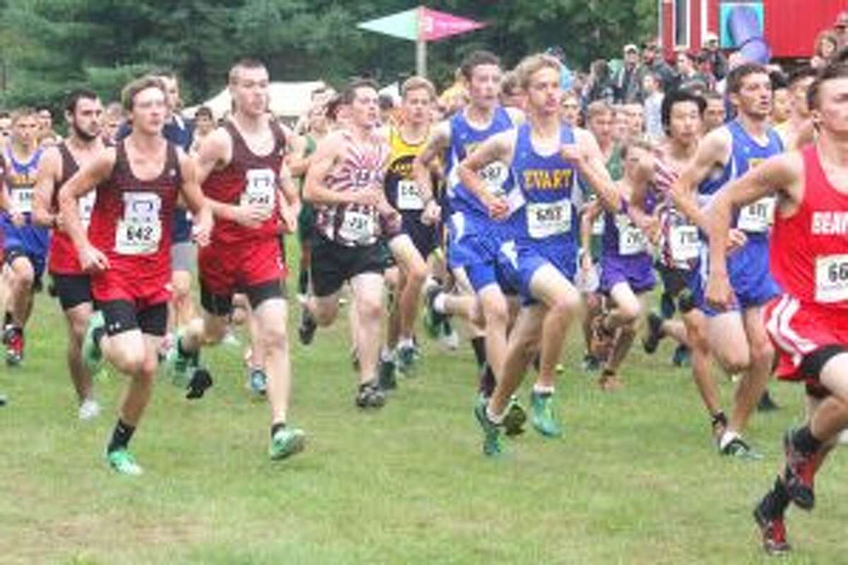 Invitational: Evart cross country runners get off to the start of the boys race at Saturday’s home invitational. (Herald Review photo/John Raffel)