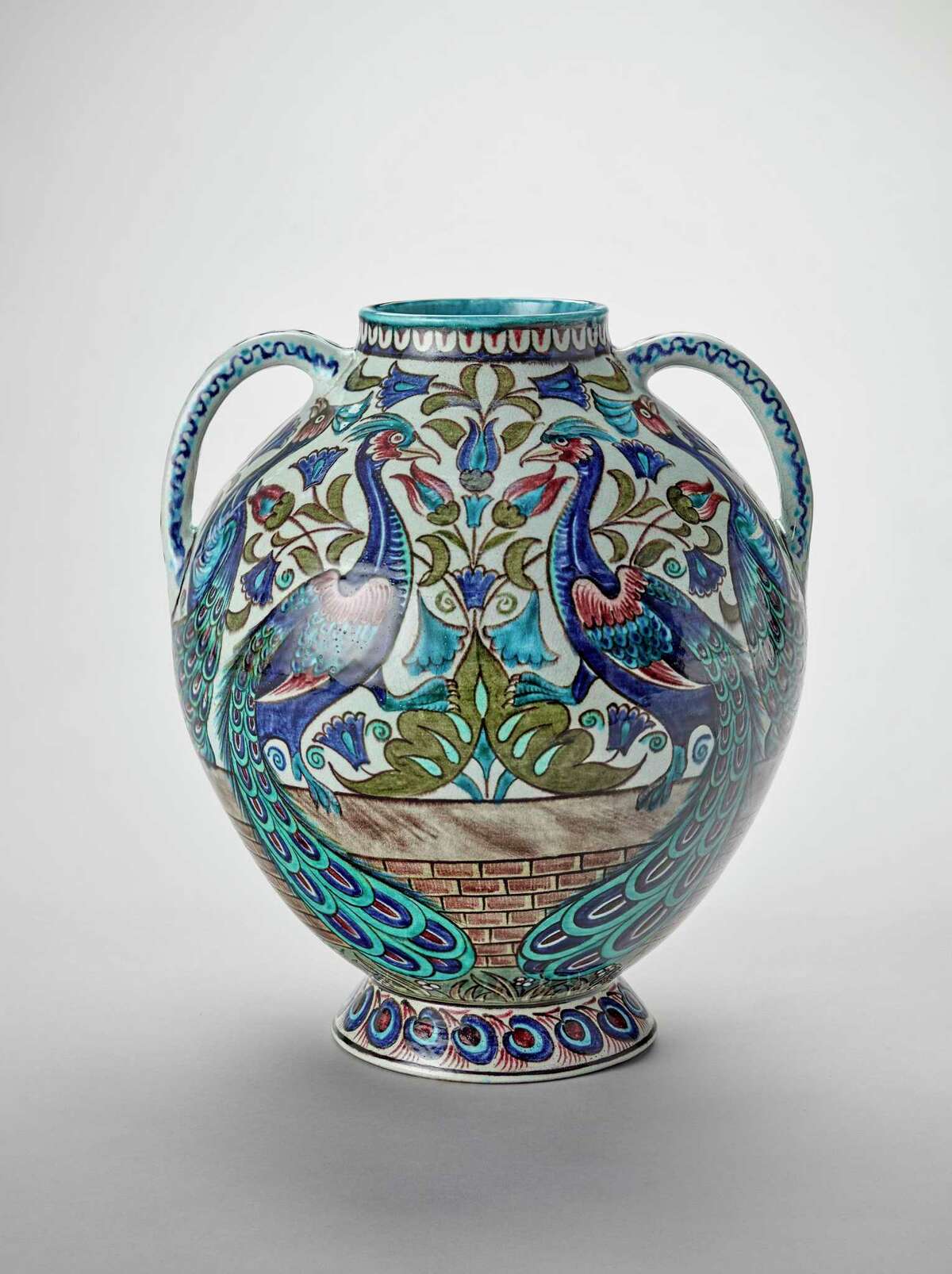 An earthenware peacock vase, circa 1885, is part of the San Antonio Museum of Art as part of the exhibit “Victorian Radicals: From the Pre-Raphaelites to the Arts and Crafts Movement.”