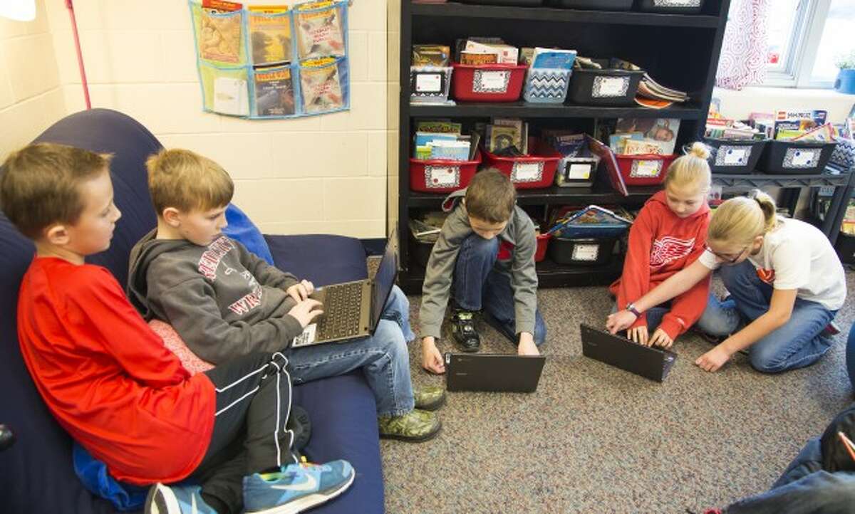 DONATIONS IN USE: GT Norman Elementary School students in Dawn Hilliard's classroom also benefited from DonorsChoose.org, as donors chose to give the classroom money toward purchasing a few new Chromebooks.