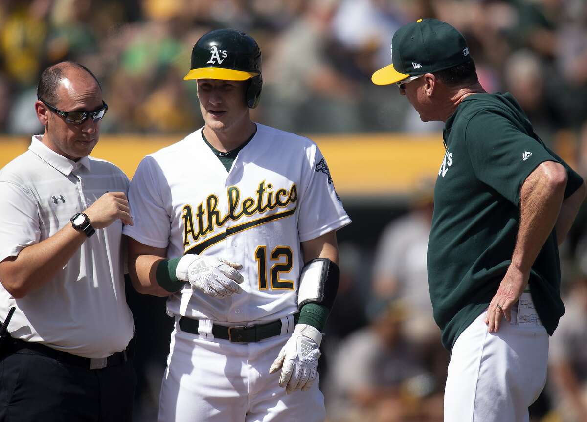 Sean Murphy of the Oakland Athletics chases after a pitch in the