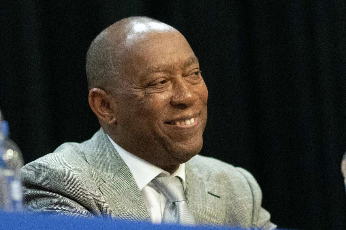 Houston mayor Sylvester Turner smiles as his elections challenger Tony Buzbee debates him during a mayoral forum focused on issues that affect the Latino community on Tuesday, Sept. 24, 2019, in Houston.