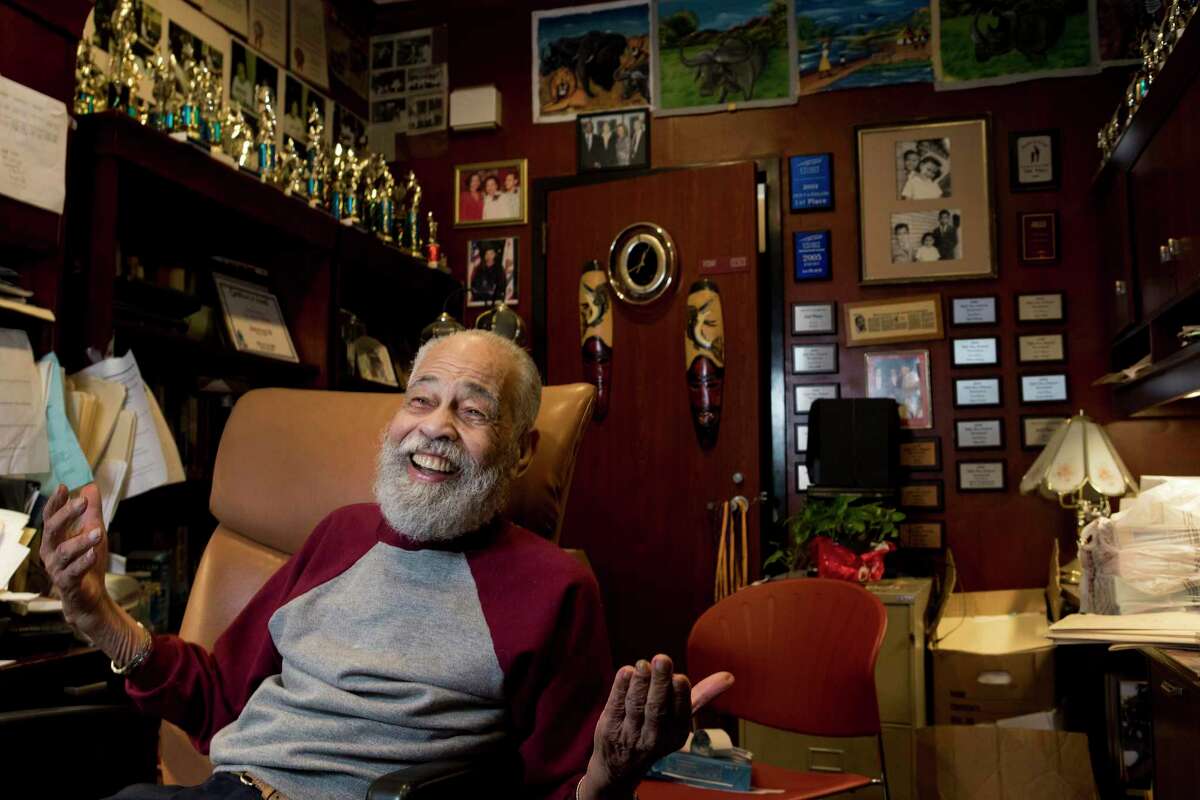 Dr. Thomas Freeman, founding dean of the Texas Southern University Honors College and longtime debate team director, laughs while working in his office on Wednesday, June 19, 2019, in Houston. Freeman has worked at the university for the past 70 years and has led the debate team to dozens of championships.