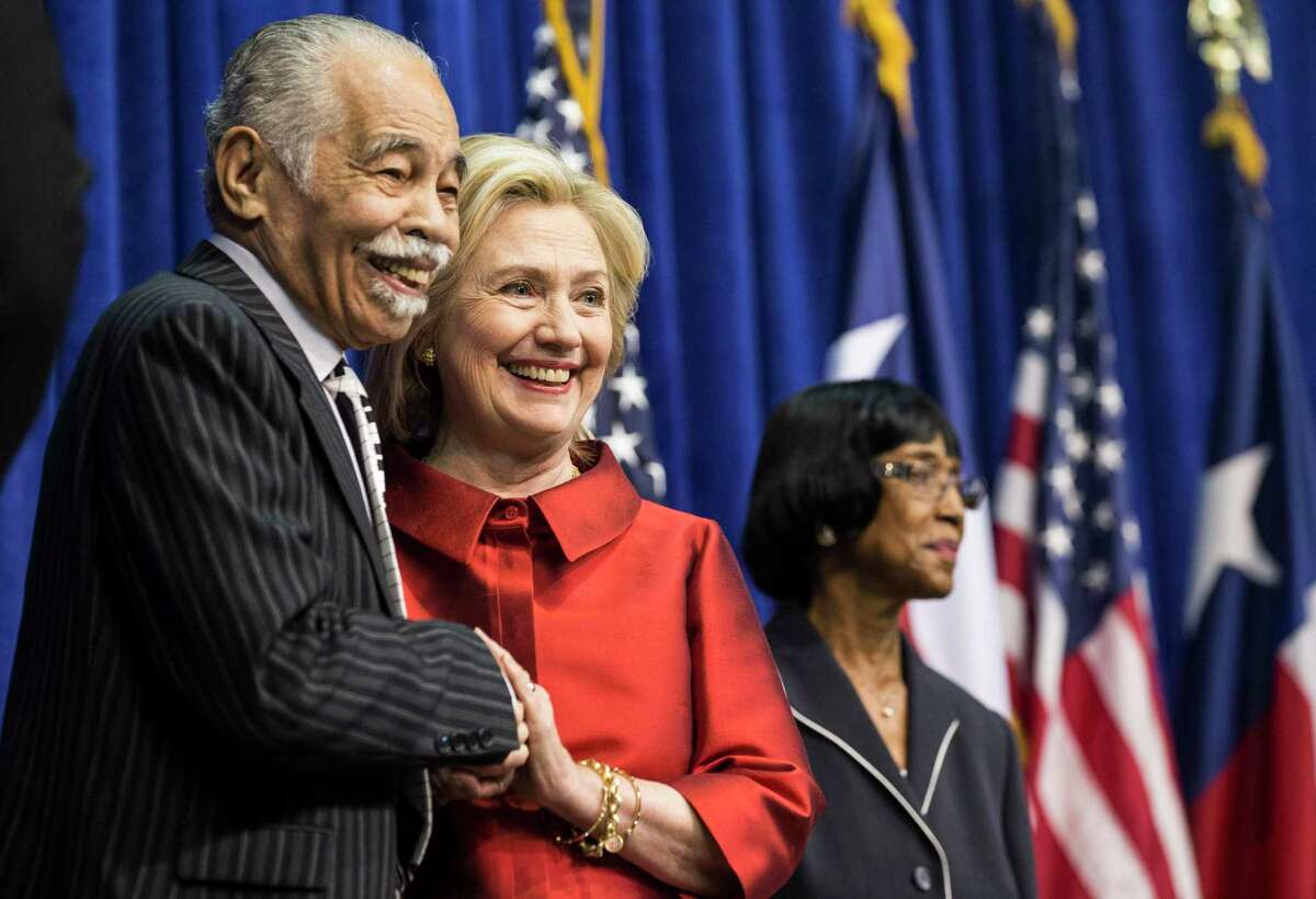 Former Secretary of State Hillary Rodham Clinton stands with Dr. Thomas Freeman before she was presented the Inaugural Barbara Jordan Gold Medallion Leadership Award on the campus of Texas Southern University on Thursday, June 4, 2015, in Houston.