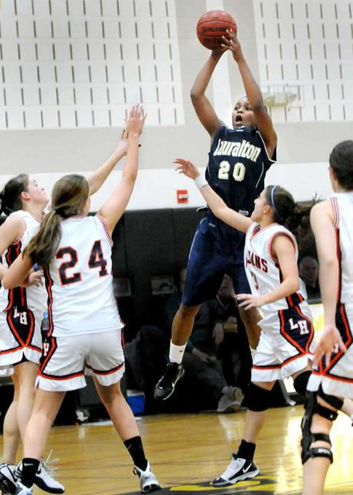 Keylantra Langley shoots over the Lyman Hall defense. Langley scored 27 points in Lauralton Hall's 65-42 victory in the Hand Holiday Tournament championship game. (Photo by Melanie Stengel/ New Haven Register)