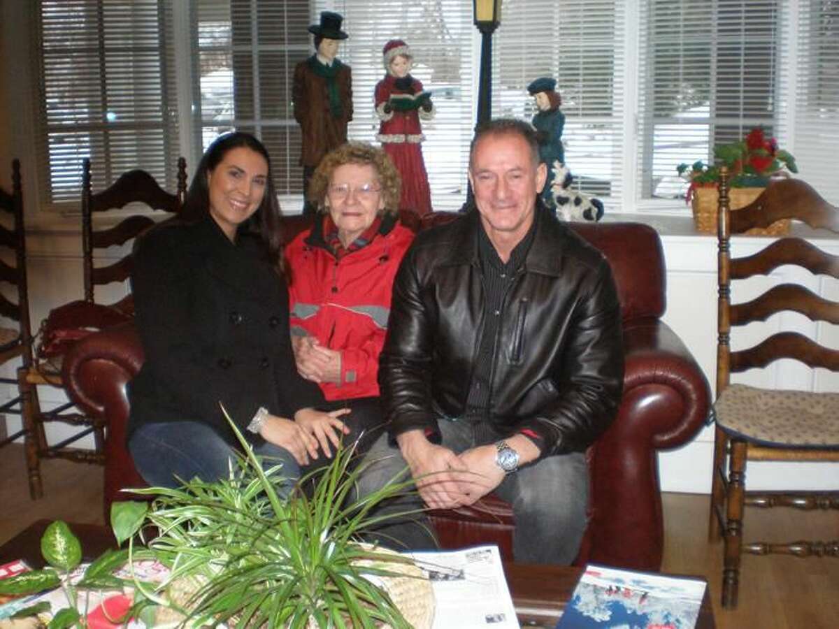 Photo by Eleanor Turkington - Paula Dunoyer, left, office assistant at the Rivercliff Fuel Company, joined to celebrate the occasion with Cicarelli and Kucewicz at the Center, recently. Installer Anthony Santilli also contributed to the placement of the heating system.