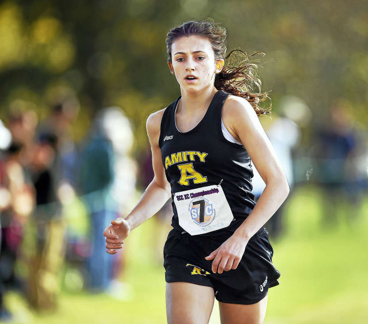Amity senior Emily Criscuolo won the SCC girls’ cross country championship meet Thursday at East Shore Park in New Haven.