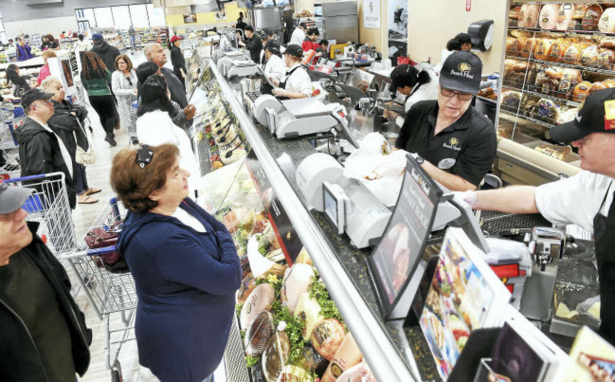 Customers line up at the deli counter during the grand opening of ShopRite on Bull Hill Lane in Orange.