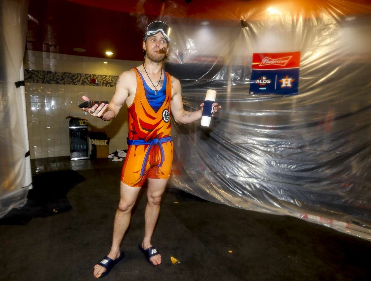 Houston Astros right fielder Josh Reddick (22) celebrates the Astros win of Game 5 of the American League Division Series at Minute Maid Park in Houston, on Thursday, Oct. 10, 2019.