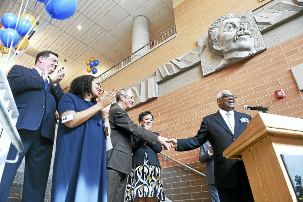 (Arnold Gold-New Haven Register) University of New Haven President Steve Kaplan (center) shakes the hand of New Haven Public Schools Superintendent Reginald Mayo (right) before the ribbon cutting ceremony in the lobby of the Engineering and Science University Magnet School in West Haven on 2/28/2017. Left to right are West Haven Mayor Ed O'Brien, ESUMS Principal Medria Blue-Ellis, University of New Haven President Steve Kaplan, New Haven Mayor Toni Harp and New Haven Public Schools Superintendent Reginald Mayo.