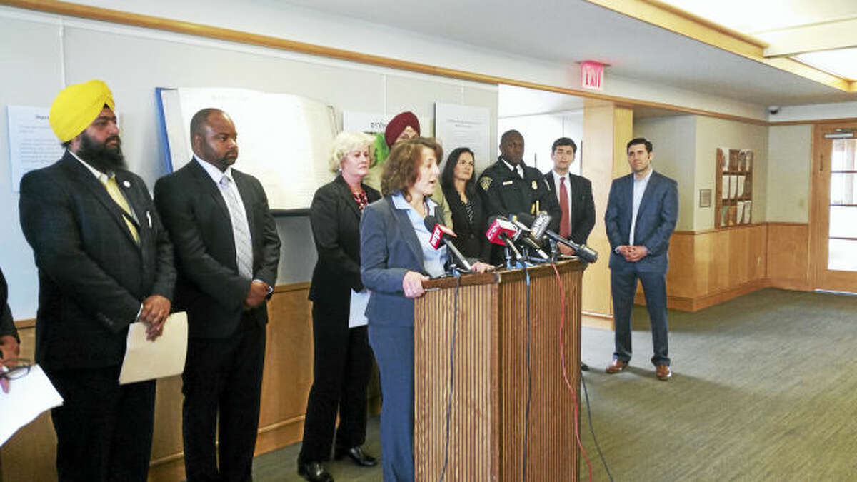 Judy Alperin, chief executive officer of the Jewish Federation of Greater New Haven, speaks at Congregation Beth El-Keser Israel about increased incidents of violence.