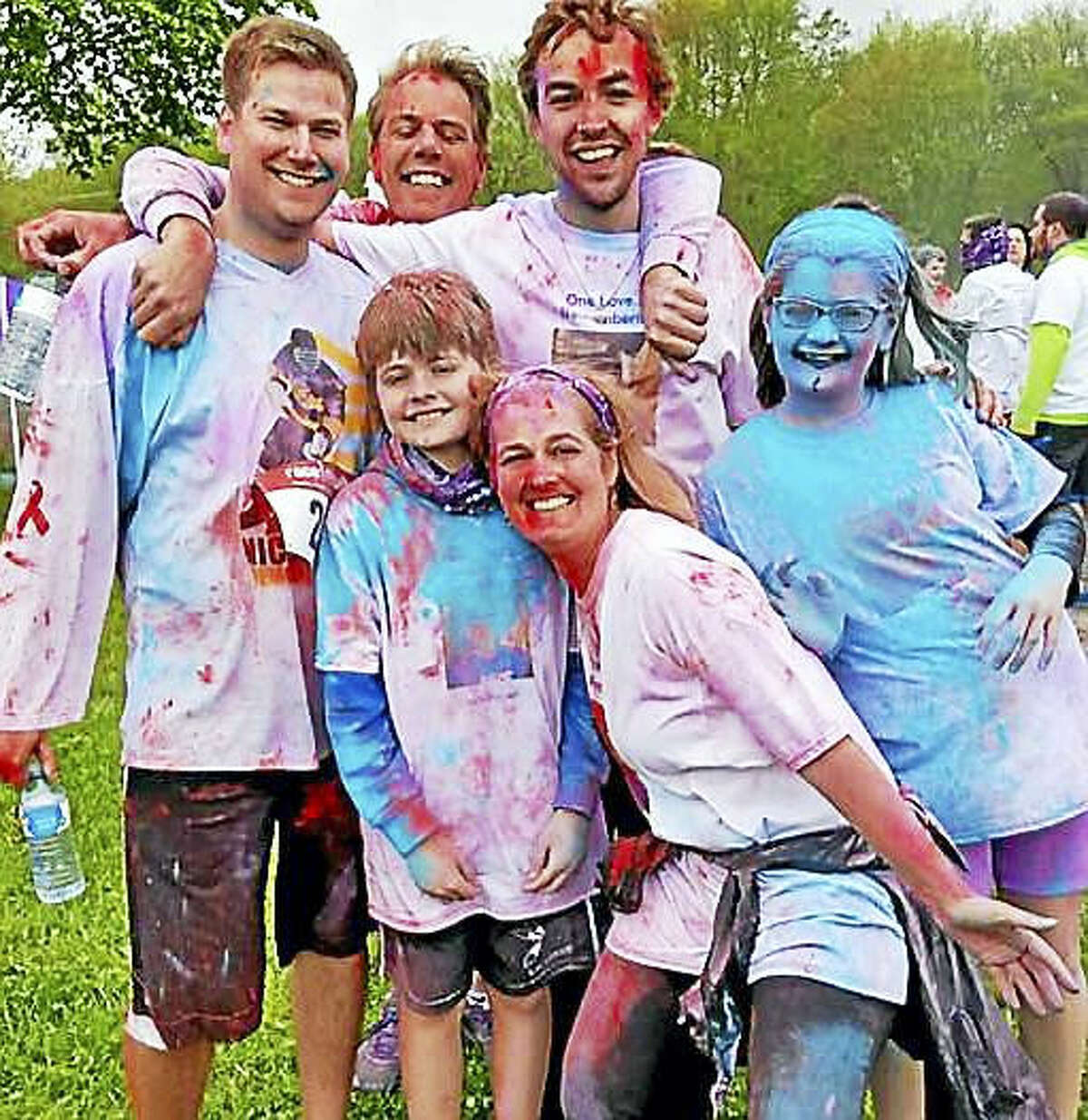 Runners and walkers were covered in color, from head to toe, in the Lifelinx/DAY 5K Nick Kruczek Color Run/Walk. Front row from left are Teagan Kruczek, Sue Kruczek and Haley Kruczek and back row from left are Matt Swicki, Kyle Kruczek and Sean Langrieger.