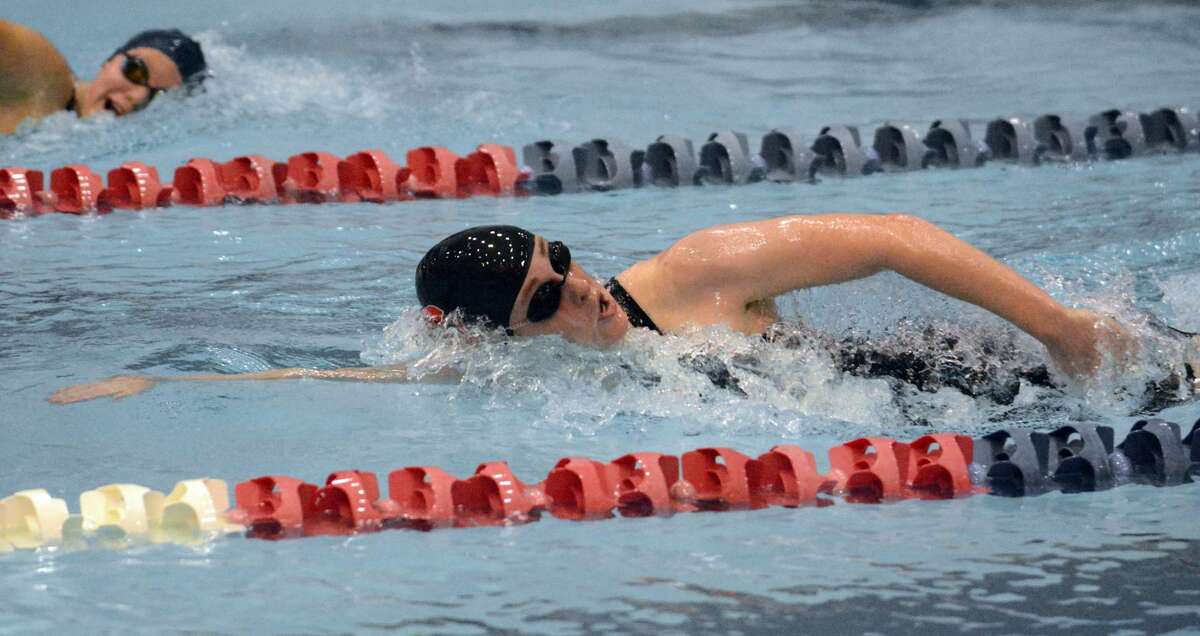 Cheshire's Liz Boyer is on her way to a win in the 500 freestyle to help the Rams win the SCC championship.