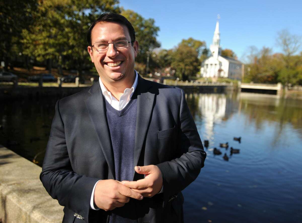 Milford Democratic Mayor Ben Blake is running unapposed for a fourth term outside City Hall in Milford, Conn. on Tuesday, October 31, 2017.