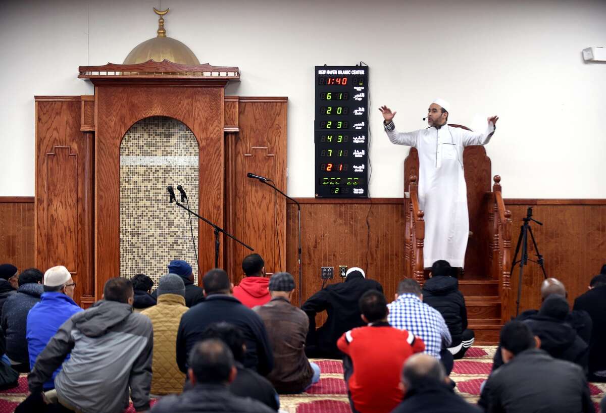 Imam Bachir Djehiche delivers a sermon before a Friday prayer service at the New Haven Islamic Center in Orange.