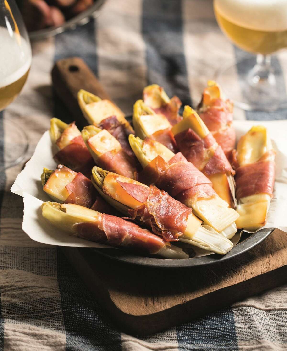 Belgian Endive with Gruyere and Prosciutto. A simple recipe will impress your guests.(this recipe is mentioned in column and on my website)
