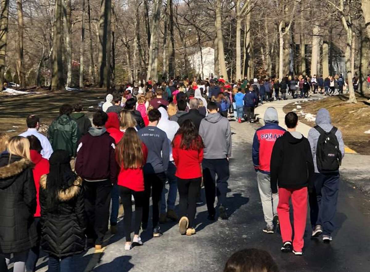 Foran High School students join the walkout.
