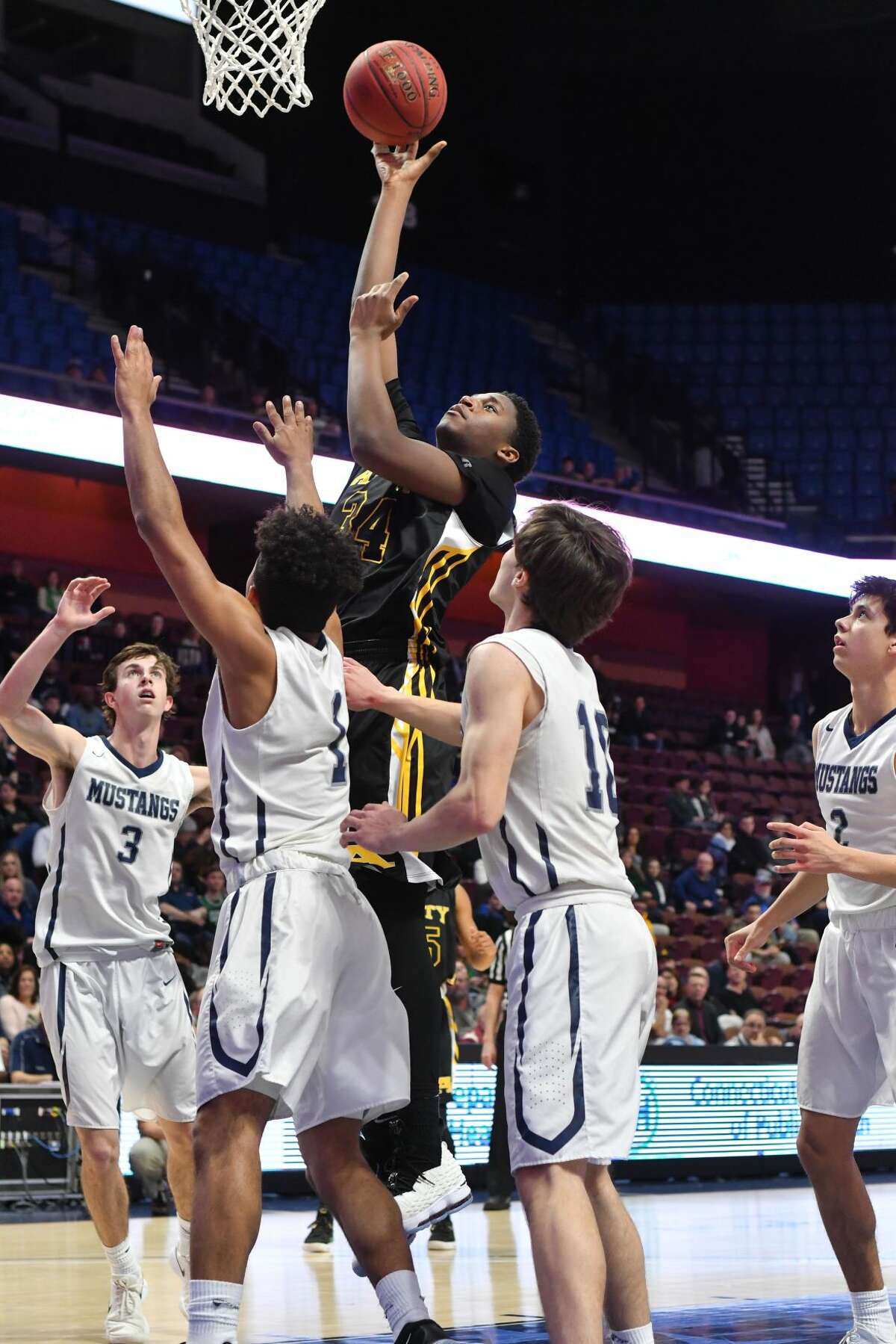Amity’s Brian Curtin shoots a short jumper during the Division II championship game on Saturday.