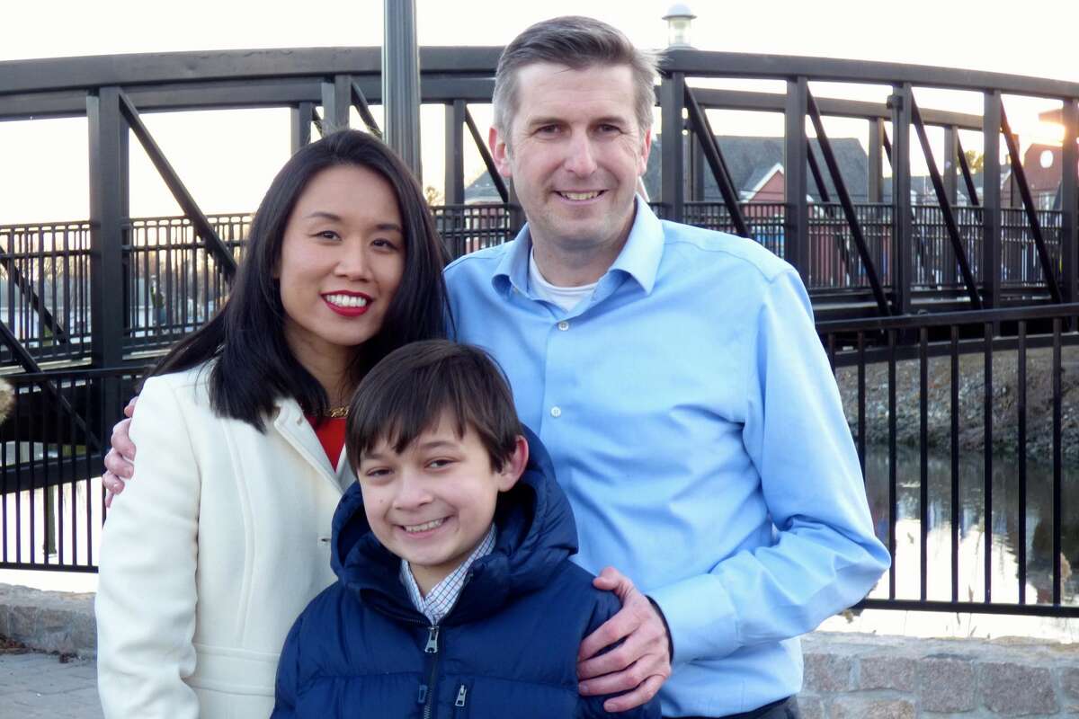Milford resident James Maroney, a Democrat who is looking to fill State Sen. Gayle Slossberg's seat in the 14th district, is pictured at the announcement of his candidacy with his wife, Dr. Jennifer Ju, and their son, Jay.
