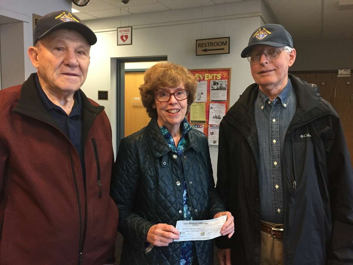 Pictured are Knights of Columbus members Tony Barbieri and Mike Kalakay with Bridges' Board Member Ann Yost of West Haven.