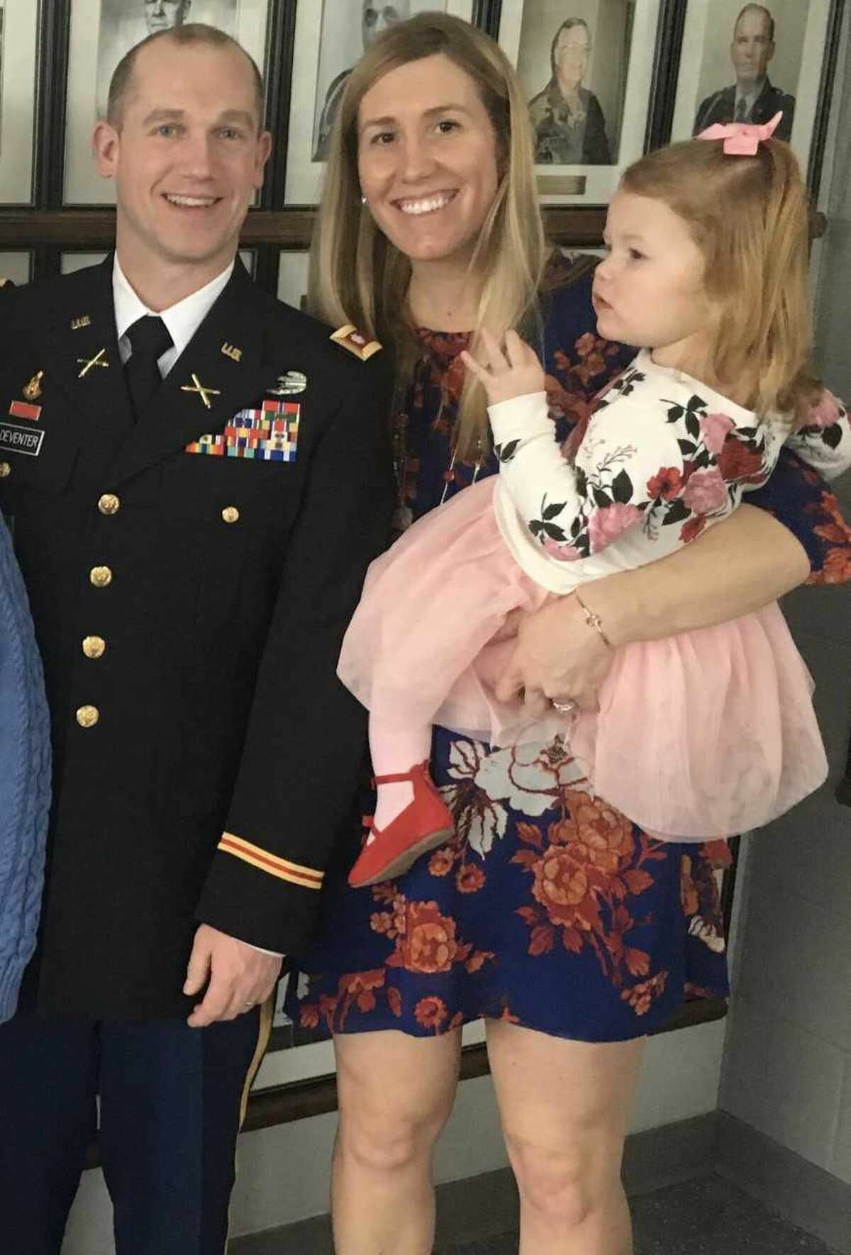 Keynote speaker Army National Guard Lt. Col. Timothy VanDeventer, with his wife and daughter.
