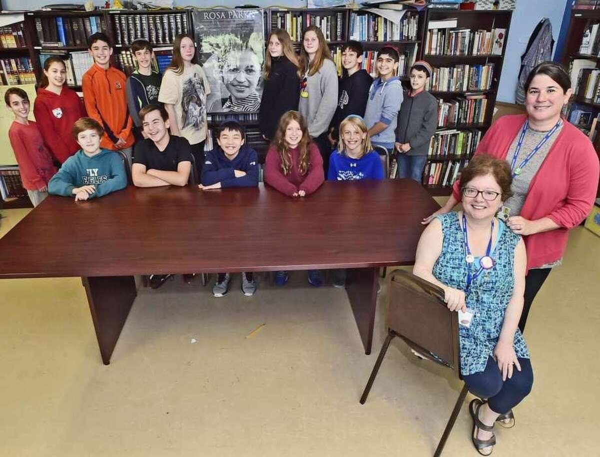 Rabbi Amanda Brodie, seated at right, and Marcy Thomaswick, team teachers who implemented the civil rights curriculum for their sixth-graders at Ezra Academy in Woodbridge.