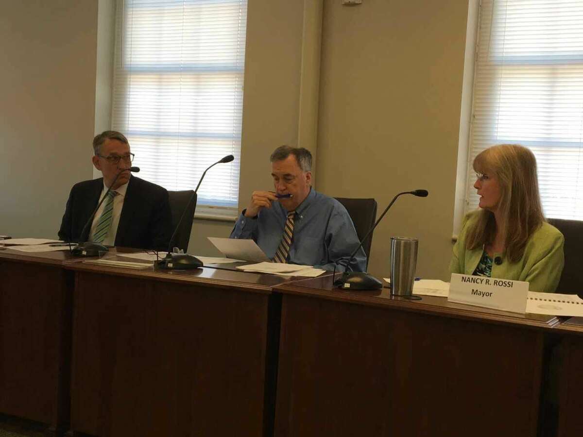 West Haven Mayor Nancy Rossi, right, speaks to state Municipal Accountability Review Board Chairman Benjamin Barnes on Thursday, May 24, at a meeting of the state Municipal Accountability Review Board's Ad Hoc Committee for West Haven.