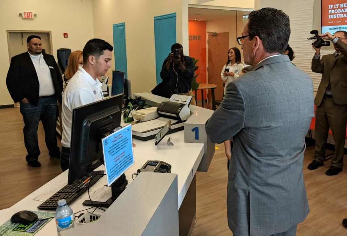 Governor Dannel P. Malloy at the new DMV Express Center at the Nutmeg State Financial Credit Union at 977 Boston Post Road in Milford.