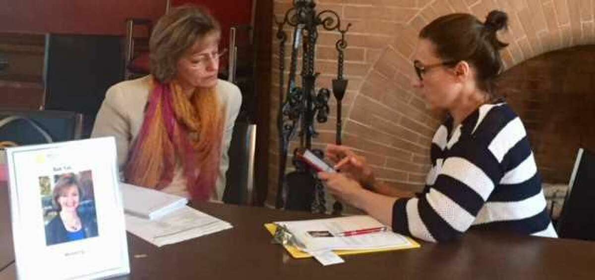 Counselor Sue Yasav, left, with client Carol Elstein at the event.