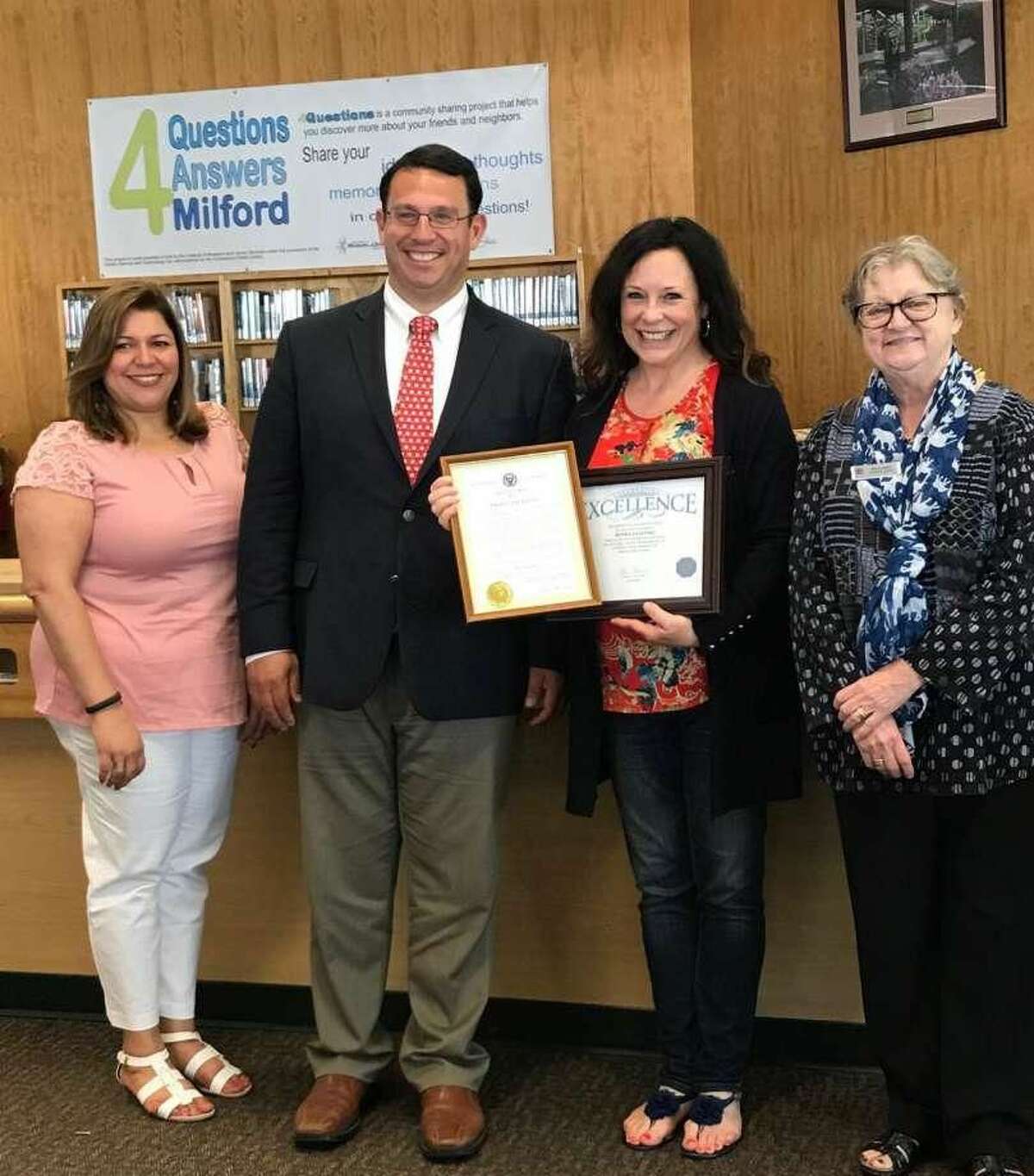 From left are City of Milford Human Resources Director Tania Barnes, Mayor Ben Blake, library staffer and employee of the month Ronda Zalenski and Assistant Library Director Nancy Abbey.