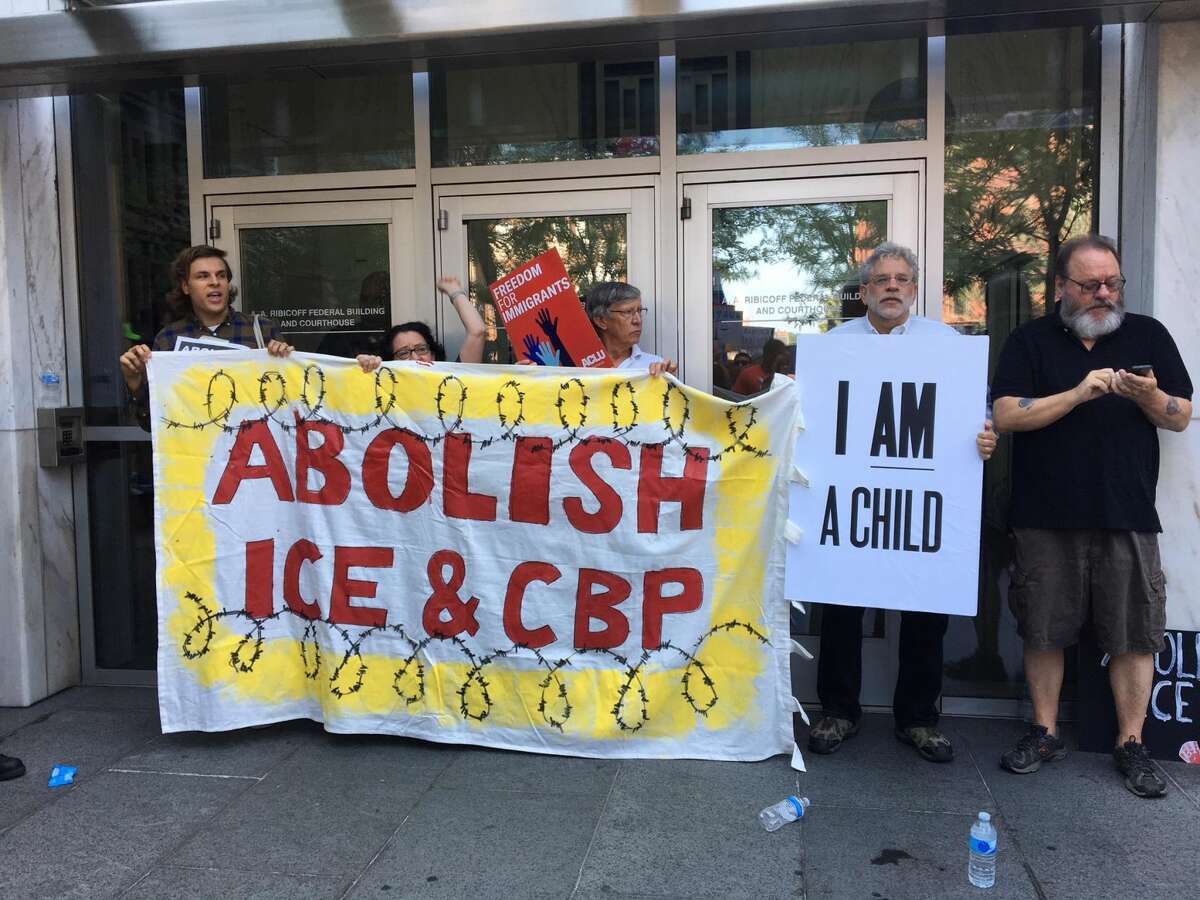 Hundreds of peaceful protesters shouted ?“shame shame?” as Hartford police arrested dozens of advocates as they blocked the entrance to the office of Immigration and Customs Enforcement Monday.