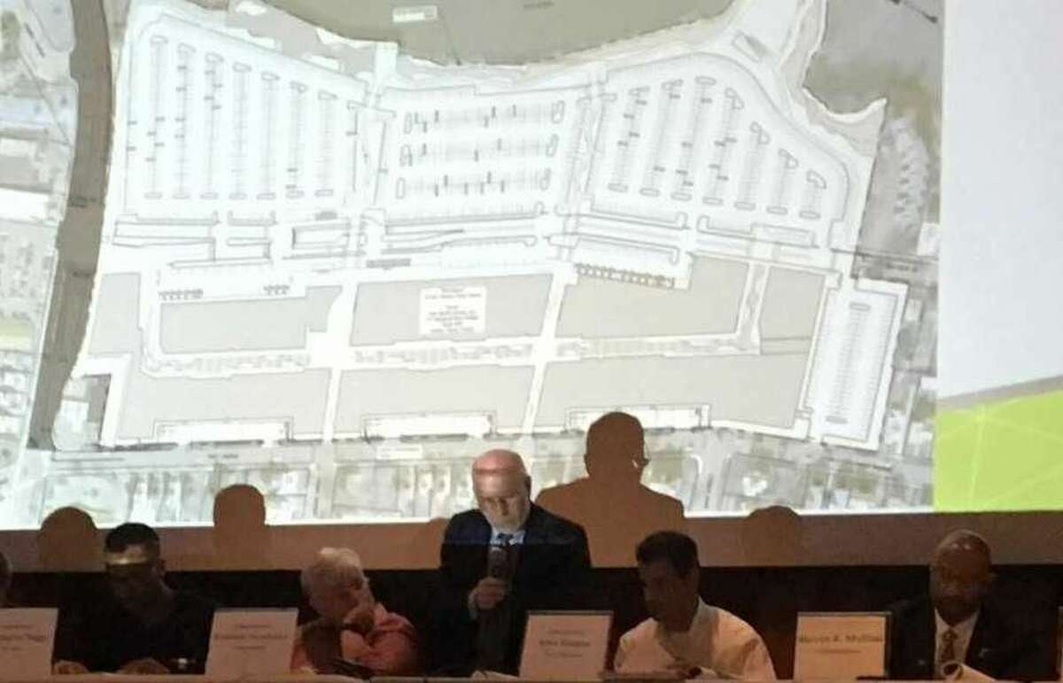 West Haven Planning and Zoning Commissioner members talk about The Haven project on Tueday, July 10, , with a map from the project's site plan projected on a screen behind them.