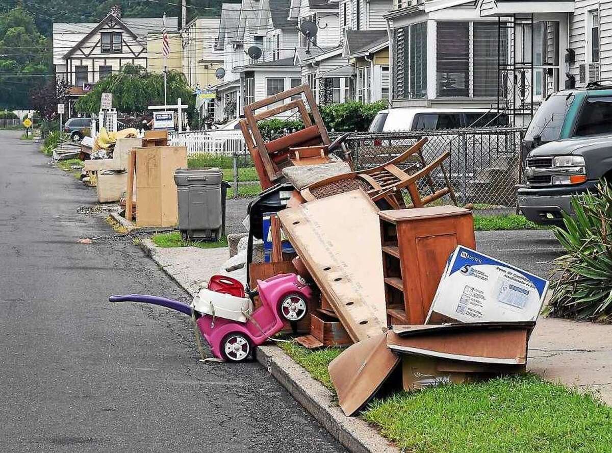 Bulk trash piled along Wharton Street in West Haven in this file photo.