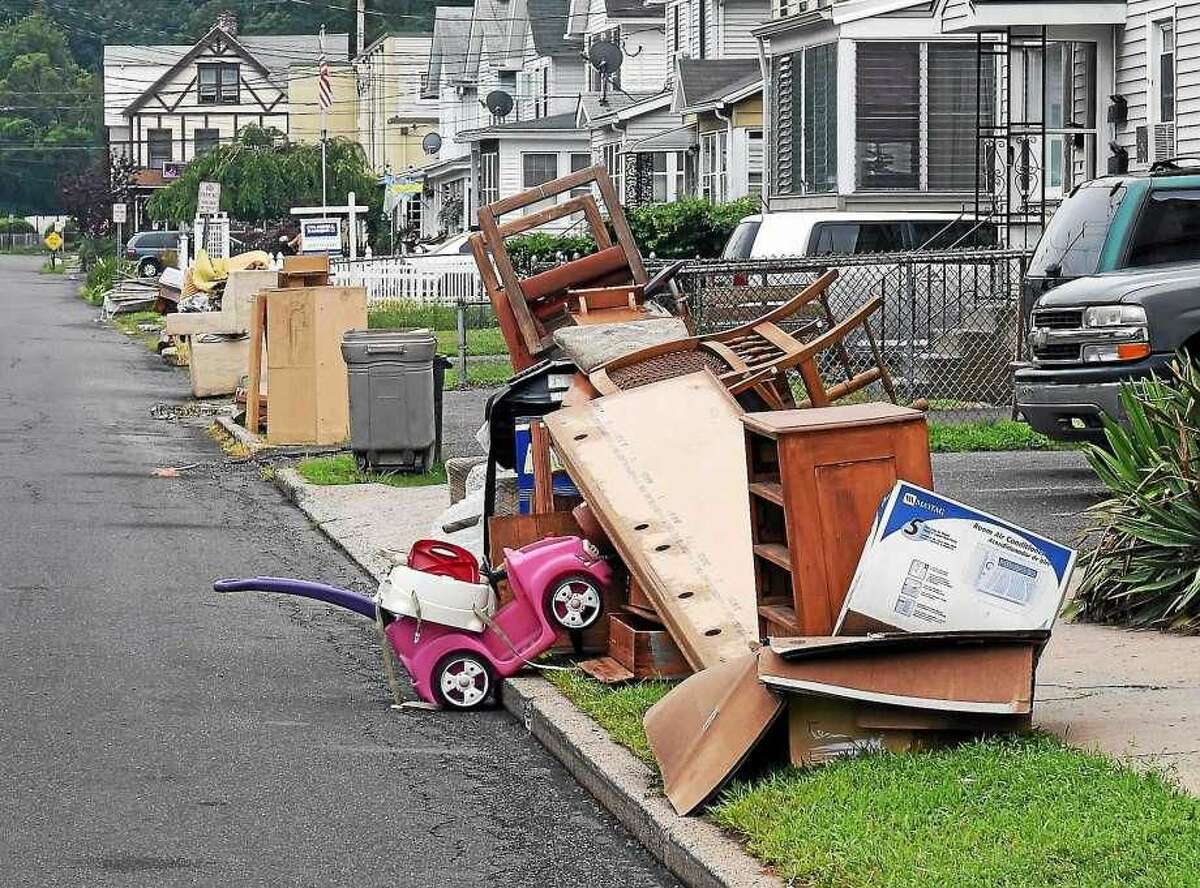 Bulk trash piled along Wharton Street in West Haven in this file photo.