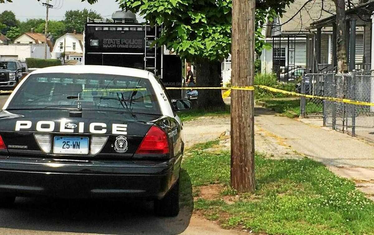 Police search 59 Front Ave. in West Haven as they investigate the death of Edward Brooks, 39, whose body was found in Hamden.