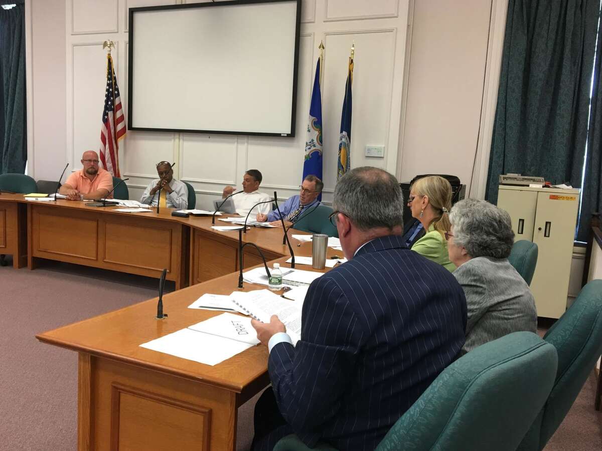 West Haven Mayor Nancy Rossi meets with members of the state Municipal Accountability Review Board in City Hall on Wednesday, Aug. 22.
