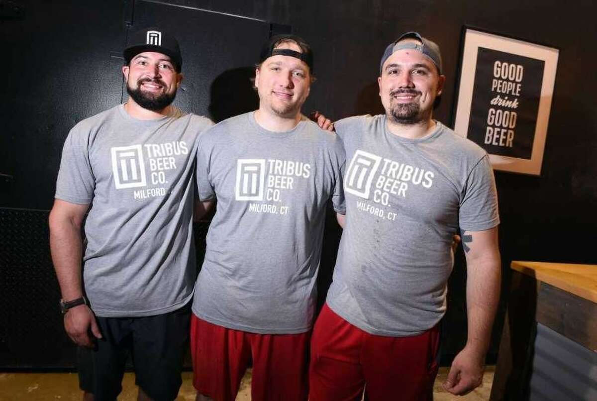 From left, Tribus Beer Company owners Sean O'Neill, Matt Weichner and Sebastian D'Agostino at their beer brewery and tap room in Milford.