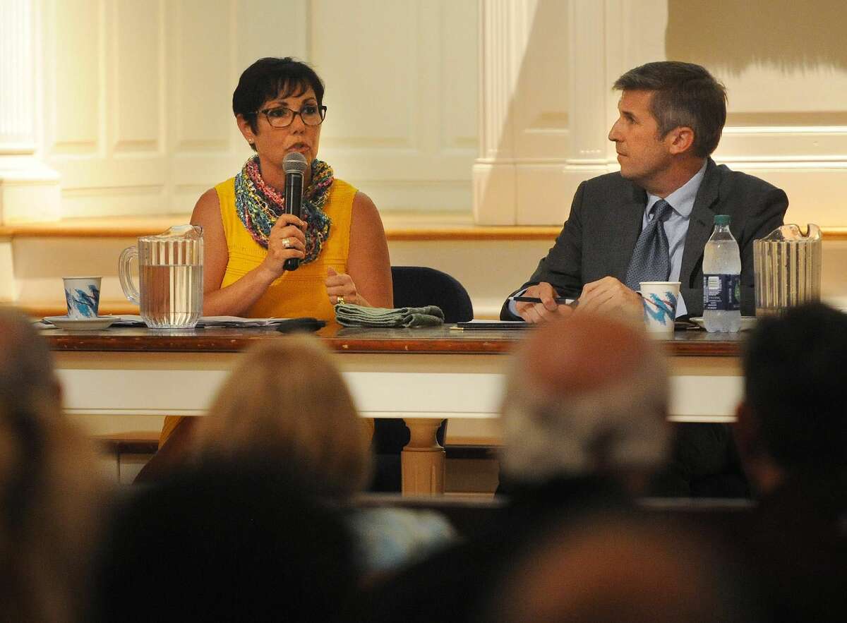 Republican Pam Staneski, left, and Democrat James Maroney, candidates for 14th distrrict state senator, square off in a debate at the First United Church of Christ in Milford on Monday, Sept.17.