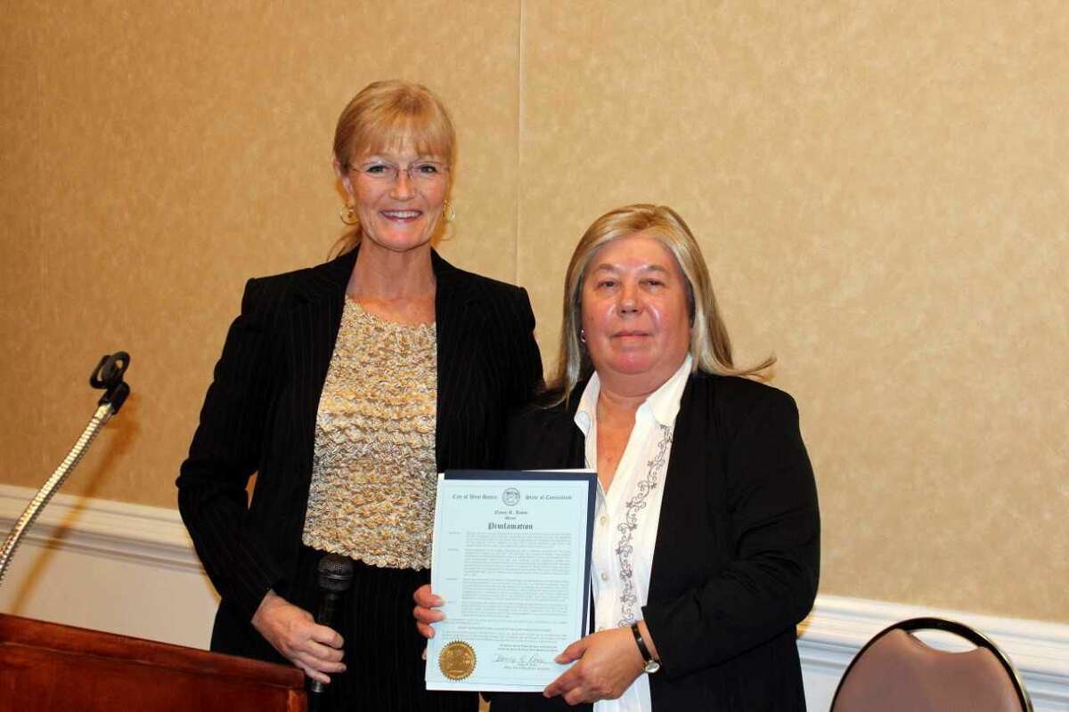 West Haven officials and elected state representatives joined elderly services advocates Wednesday, Sept. 26, to mark the 50th Anniversary of the Allingtown and West Haven senior centers during a luncheon in the Cielo Banquet Hall Ballroom. Mayor Nancy Rossi presented a proclamation commemorating the centers golden anniversary to Elderly Services Director Sharon Mancini, right.